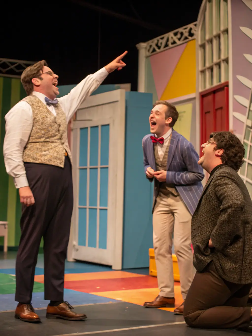 A diverse group of actors performing a scene from one of La Pirouette Théâtre's annual comedy productions, highlighting the quality and entertainment value.