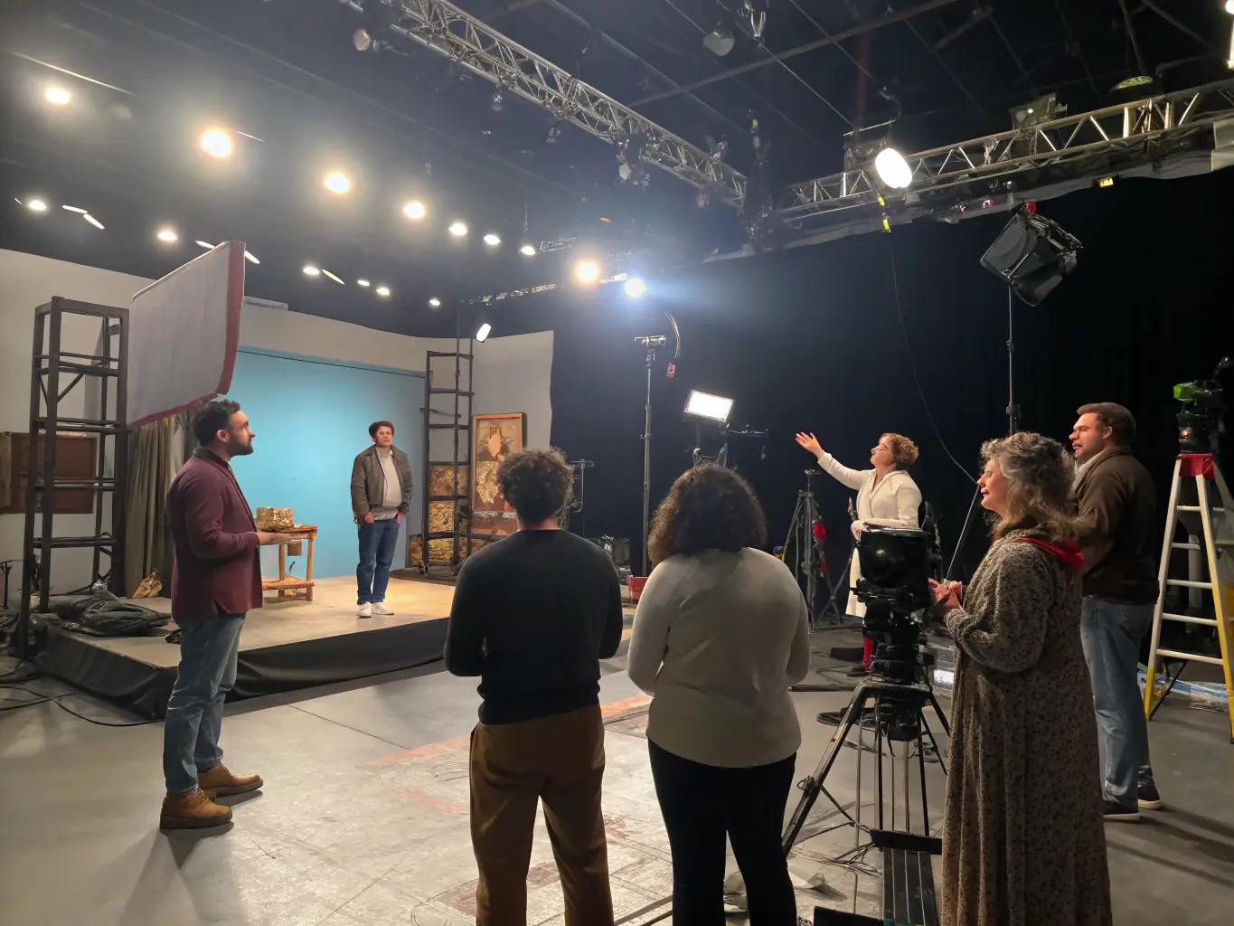 A dynamic image of adult actors rehearsing a scene from one of La Pirouette Théâtre's comedy productions, highlighting the energy and collaborative spirit of the group.